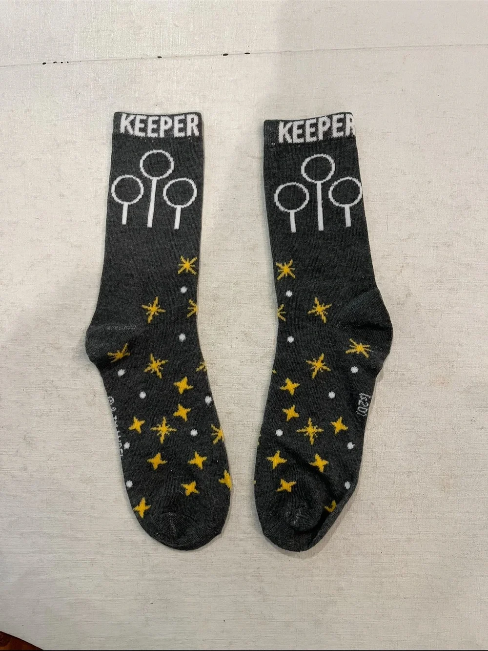 Harry Potter Dark Gray KEEPER Crew Socks with Yellow Star Pattern. GUC!